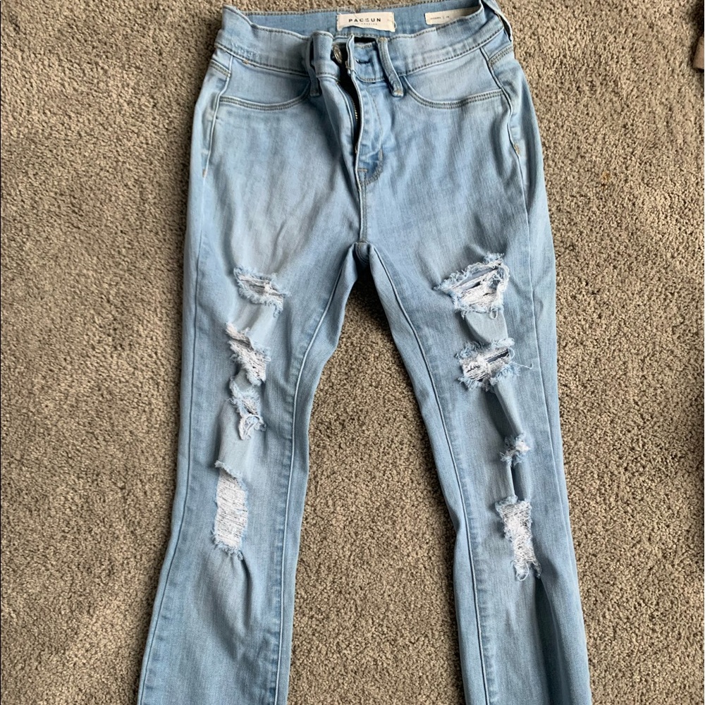 light washed jeans w/ holes
